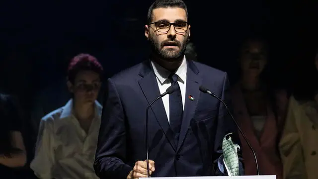 epa11389732 Palestinian photojournalist Motaz Azaiza delivers a speech after receiving the Freedom Prize, in Caen, France, 04 June 2024. Azaiza has been rewarded for his work during the Israel-Hamas conflict in Gaza. Inspired by the D-Day landings of 06 June 1944 in Normandy, the Freedom Prize is an educational initiative aimed at raising awareness of freedom, peace, and human rights. EPA/ANDRE PAIN