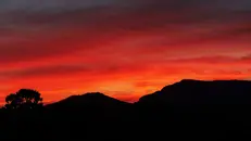 Il colore rosso che dipinge il paesaggio