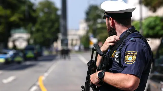 epa11586467 A police officer secures the area after a shooting near the NS Documentation Center for the History of National Socialism building in Munich, Germany, 05 September 2024. German police officers on 05 September shot a man who was firing a firearm near the Israeli Consulate General and the Nazi Documentation Center in Munich. According to the police, there is no evidence of any other suspects. EPA/ANNA SZILAGYI