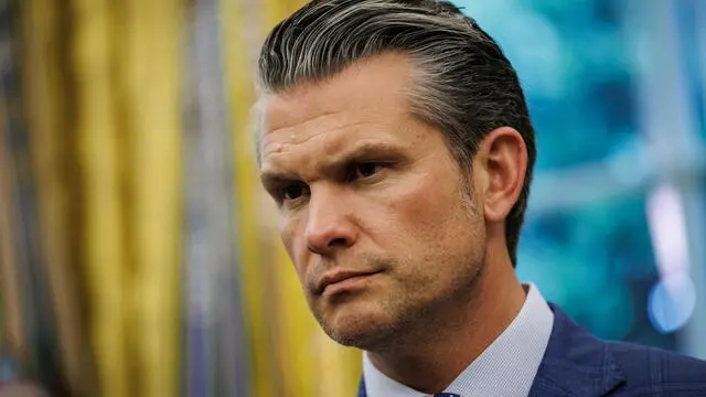 epa12129409 US Secretary of Defense Pete Hegseth with US President Donald Trump (not pictured) in the Oval Office before signing executive orders on nuclear energy at the White House, Washington, D.C., USA, 23 May 2025. Trump signed a total of five executive orders aimed at easing restrictions and expanding the nuclear energy industry. EPA/SAMUEL CORUM / POOL
