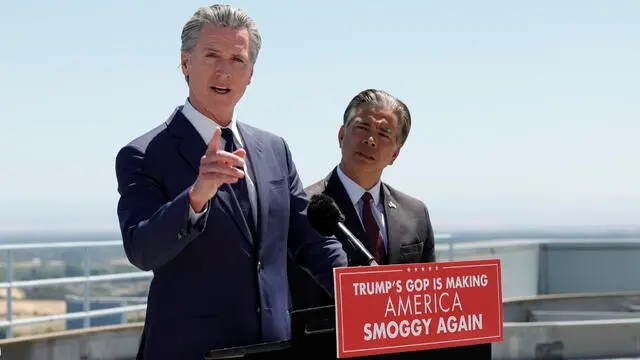 epa12126881 California Governor Gavin Newsom (L) and Attorney General Rob Bonta (R) responds to the US Senate's votes to kill California's electric car mandate during a press conference in Sacramento, California, USA, 22 May 2025. Attorney General Rob Bonta announced that California will bring a lawsuit against the Trump Administration. EPA/JOHN G. MABANGLO