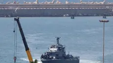 epa12166164 Israeli Navy vessels enter the port of Ashdod, Israel, 09 June 2025. The Freedom Flotilla Coalition (FFC) stated its Gaza-bound Madleen ship, carrying a small shipment of humanitarian aid, was forcibly intercepted by the Israeli military in international waters on 09 June 2025. Israeli authorities said the flotilla was prevented from breaking a Gaza Strip blockade and was escorted to Israel's port of Ashdod, adding that its passengers were expected to return to their home countries. EPA/ABIR SULTAN