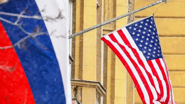 epa12022377 Russian and US flags hang on the main building of the US Embassy in Moscow, Russia, 10 April 2025. The second round of consultations between Russian and US delegations, led by the Russian Ambassador to the US, Alexander Darchiev, and US Deputy Assistant Secretary of State for European and Eurasian Affairs, Sonata Coulter, is taking place in the Russian Consulate General in Istanbul, where the two countries are discussing the normalization of the work of their embassies. As reported by the State Department's official representative, Tammy Bruce, the settlement of the conflict in Ukraine and security issues are not planned to be discussed at this meeting. EPA/MAXIM SHIPENKOV