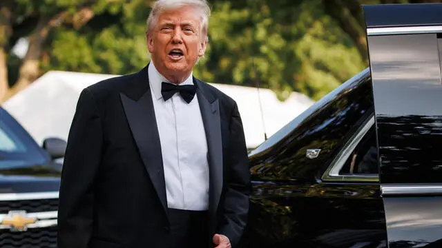 epa12170760 US President Donald J. Trump gestures next to First Lady Melania Trump (not pictured) as he leaves for the opening night of Les Miserables at the Kennedy Center in Washington, DC, USA, on June 11, 2025. EPA/Samuel Corum/Sipa USA