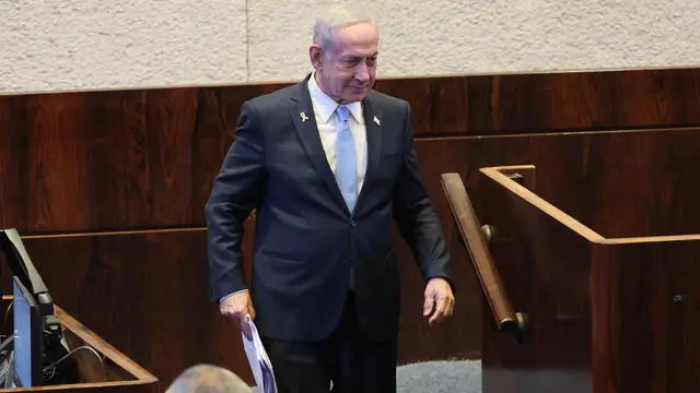 epa12170339 Israeli Prime Minister Benjamin Netanyahu during a special plenary session in honor of the visit of Argentina's President Javier Milei at the Knesset, the Israeli Parliament, in Jerusalem, 11 June 2025. Argentina's President Javier Milei is on three-day visit to Israel. EPA/ABIR SULTAN