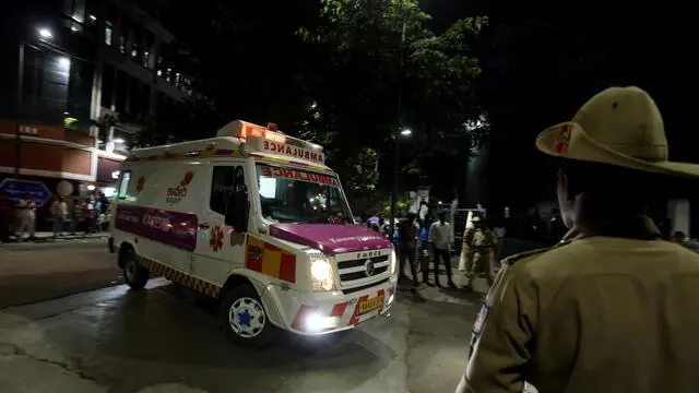 epa12155725 An ambulance transports an injured person after a stampede incident at Bowring Hospital in Bangalore, India, 04 June 2025. According to the police, at least 8 people died and dozens were injured after a stampede incident occurred when Royal Challengers Bengaluru fans broke through gates and barricades during a felicitation event following RCB's Indian Premier League victory. EPA/JAGADEESH NV