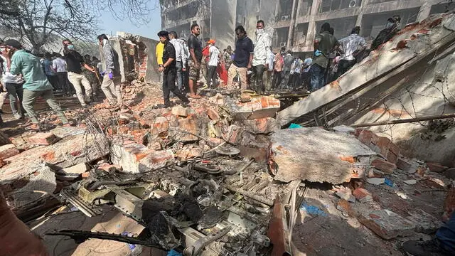 epaselect epa12171151 The site of a plane crash near Sardar Vallabhbhai Patel International Airport in Ahmedabad, Gujarat, western India, 12 June 2025. Air India flight AI171, bound for London carrying 242 passengers and crew members on board a Boeing 787-8 aircraft, crashed minutes after take-off in the Meghaninagar area of Ahmedabad. EPA/SIDDHARAJ SOLANKI 88168