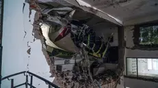 epa12171789 The site of a plane crash near Sardar Vallabhbhai Patel International Airport in Ahmedabad, Gujarat, western India, 12 June 2025. Air India flight AI171, bound for London carrying 242 passengers and crew members on board a Boeing 787-8 aircraft, crashed minutes after take-off in the Meghaninagar area of Ahmedabad. EPA/SIDDHARAJ SOLANKI
