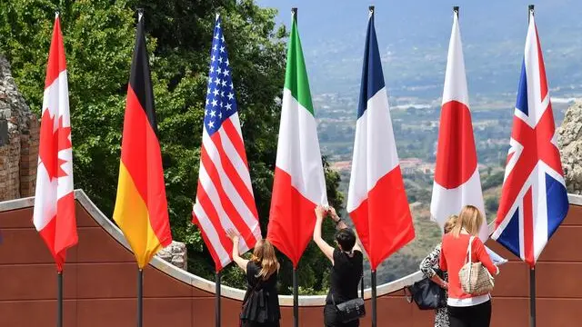 Flags are placed at the Ancient theatre of Taormina, the venue of the annual G7 summit, in Taormina, Sicily, Italy May 26, 2017. The G7 Summit will be held from 26 to 27 May 2017. ANSA/ETTORE FERRARI