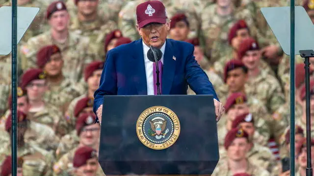 epa12169142 US President Donald Trump speaks at Fort Bragg to celebrate the US Army's 250th anniversary at Pike Field at Fort Bragg, North Carolina, USA, 10 June 2025. Fort Bragg is home to the 82nd Airborne Division, Joint Special Operations Command and other units. EPA/STAN GILLILAND