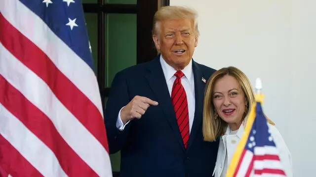 epa12037068 US President Donald Trump (L) greets Italian Prime Minister Giorgia Meloni (R) at the White House, Washington, DC, USA, 17 April 2025. EPA/WILL OLIVER