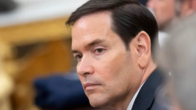 epa12158291 US Secretary of State Marco Rubio listens during a meeting between the US president and the German chancellor at the Oval Office of the White House in Washington, DC, USA, 05 June 2025. EPA/CHRIS KLEPONIS / POOL