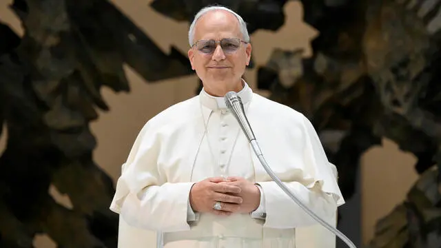 A handout picture provided by the Vatican Media shows Pope Leo XIV during a meeting with the Clergy of the Diocese of Rome in the Paul VI Audience Hall, Vatican City, 12 June 2025.