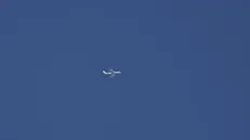 epa12172993 An Israeli military logistic airplane flies over Jerusalem, on 13 June 2025. Israelâ€™s Home Front Command announced on 13 June the enforcement of a stricter defense policy, including â€œprohibition on educational activities, gatherings, and workplaces, except for essential sectorsâ€, following early morning airstrikes carried out over Iran. EPA/ATEF SAFADI