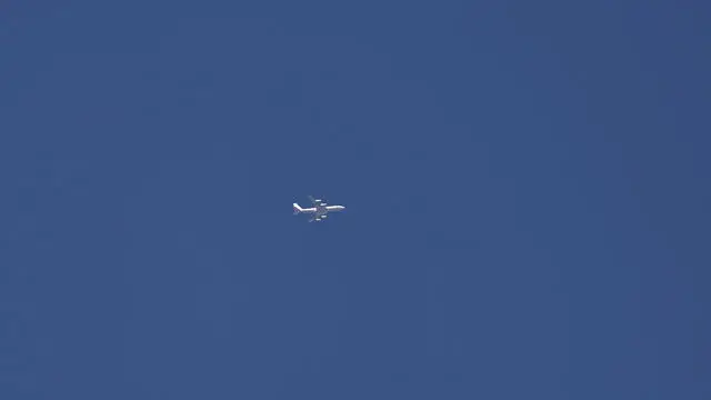 epa12172993 An Israeli military logistic airplane flies over Jerusalem, on 13 June 2025. Israelâ€™s Home Front Command announced on 13 June the enforcement of a stricter defense policy, including â€œprohibition on educational activities, gatherings, and workplaces, except for essential sectorsâ€, following early morning airstrikes carried out over Iran. EPA/ATEF SAFADI