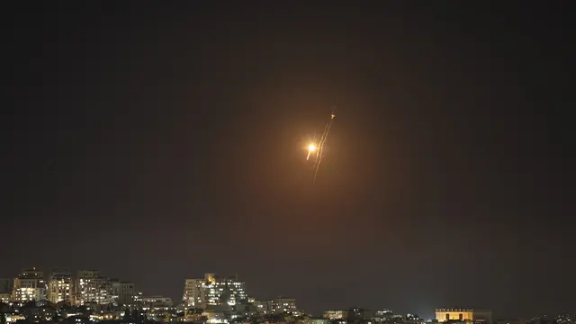 epa12173751 Missiles launched from Iran as seen over Jerusalem, 13 June 2025. Israelâ€™s military has identified missiles being launched from Iran towards the territory of Israel in retaliation following overnight airstrikes on Iranian targets. EPA/ATEF SAFADI