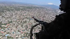 epa11846078 A view of the city of Cucuta during an overflight in Cucuta, Colombia, 22 January 2025. The streets of Tibu, an oil town in the Colombian department of Norte de Santander, have once again become the scene of the exodus of thousands of people seeking refuge from the violence between the guerrilla group of the National Liberation Army (ELN) and one of the dissident groups of FARC. EPA/MARIO CAICEDO