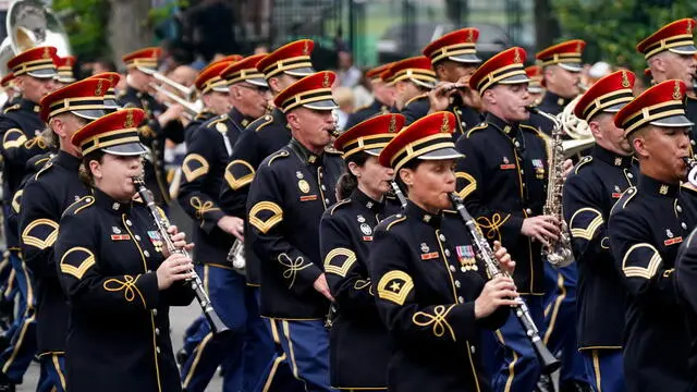epa12176038 Members of the military march during the US Army's 250th Anniversary Parade in Washington, DC, USA, 14 June 2025. The parade, which happens to coincide with US President Donald Trump’s 79th birthday, is expected to cost up to $45 million and feature 6,600 soldiers, 50 helicopters and 60-ton M1 Abrams battle tanks. EPA/KENT NISHIMURA / POOL