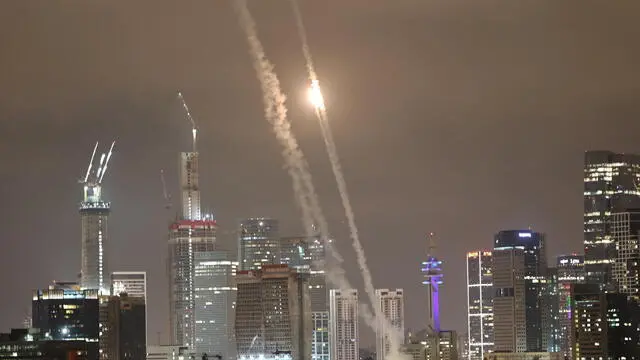 epa12176271 Israel's Iron Dome air defense system intercepts ballistic missiles fired from Iran over the city of Tel Aviv, Israel, 15 June 2025. Israel's military identified the missiles as being launched from Iran toward Israeli territory in retaliation for overnight airstrikes on Iranian targets. EPA/ATEF SAFADI
