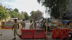 epa12176631 Police guards the Air India airplane crash site near Sardar Vallabhbhai Patel International Airport in Ahmedabad, Gujarat, western India, 15 June 2025. Air India flight AI171, bound for London carrying 242 passengers and crew members on board a Boeing 787-8 aircraft, crashed minutes after take-off in the Meghaninagar area of Ahmedabad on 12 June. EPA/RAJAT GUPTA