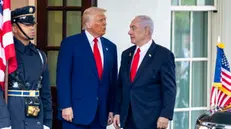 epa12016439 US President Donald J. Trump (C) greets Israeli Prime Minister Benjamin Netanyahu (R) as he arrives for a meeting at the West Wing of the White House in Washington, DC, USA, 07 April 2025. President Trump and Prime Minister Netanyahuâ€™s East Room press conference has been cancelled. EPA/SHAWN THEW