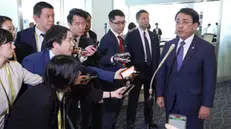 epa12064653 Ryosei Akazawa (R), Minister in charge of Economic Revitalization of Japan, speaks to reporters before his departure for the US at Haneda airport in Tokyo, Japan, 30 April 2025. Akazawa is in charge of negotiations in the Japan-US talks over the review of tariff measures by the Trump administration and is scheduled to attend a second round of negotiations on 01 May 2025. EPA/JIJI PRESS JAPAN OUT EDITORIAL USE ONLY