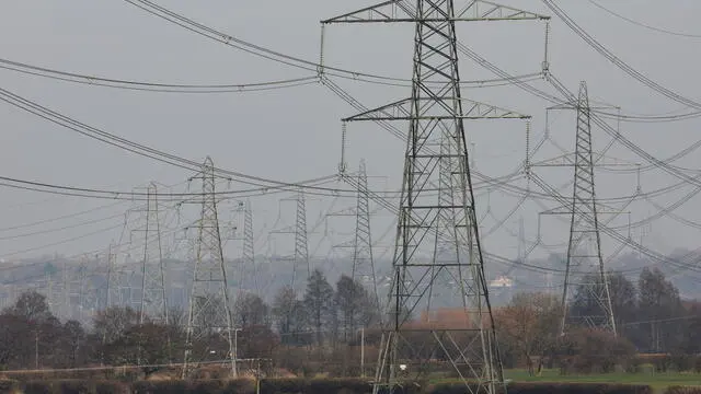 epa11905151 Electricity pylons in Frodsham, Britain, 18 February 2025. Britain’s Labour government pledged in their election manifesto to double the UK’s onshore wind capacity and triple solar power by 2030, but have been criticised for expanding aviation and backing a third runway at London Heathrow in defiance of their own ‘carbon budget’. EPA/ADAM VAUGHAN