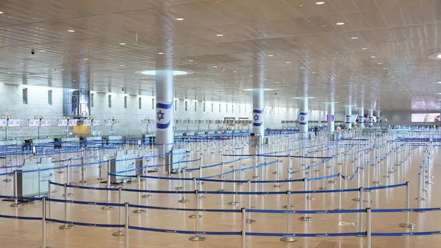 epa12178563 An empty departure terminal at Ben Gurion Airport near Tel Aviv, Israel, 16 June 2025. The Israel Airports Authority (IAA) suspended all travel at the airport after Israel launched strikes on Iran on 13 June, leaving tens of thousands of Israelis stranded abroad. EPA/ABIR SULTAN
