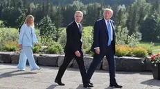 epa12180119 (L-R) Italian Prime Minister Giorgia Meloni, Canadian Prime Minister Mark Carney, and US President Donald Trump depart after a family photo during the Group of Seven (G7) Summit at the Kananaskis Country Golf Course in Kananaskis, Alberta, Canada, 16 June 2025. World leaders are gathered from 15 to 17 June 2025 for the annual G7 Summit. EPA/LUDOVIC MARIN / POOL