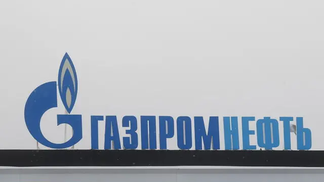epa10479964 The logo of the Gazprom Neft Russian oil producing company at a gas station in Moscow, Russia, 20 February 2023. Gazprom Neft, one of the largest oil producing companies in Russia, is a subsidiary of Gazprom, which owns nearly 96 percent of its shares. EPA/MAXIM SHIPENKOV