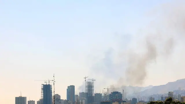 epa12180804 Smoke rises after an Israel airstrike in central Tehran, Iran, 17 June 2025. Israel has been conducting strikes across Iran since 13 June, targeting nuclear, military, and energy facilities, prompting Iran to launch retaliatory waves of missiles and drones toward Israel. EPA/ABEDIN TAHERKENAREH