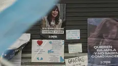 epa12179813 Photograph of posters in front of the house of former Argentinean President Cristina Fernandez de Kirchner, in Buenos Aires, Argentina, 16 June 2025. Fernandez's home is surrounded by dozens of supporters, as she is set to hand herself over to the courts on 18 June to begin serving a six-year prison sentence for irregularities in the concession of road works. EPA/PABLO BARRERA