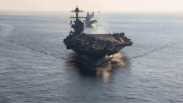 epa10908678 (FILE) - A handout file photo made available by the US Navy shows the aircraft carrier USS Gerald R. Ford (CVN 78) in the Ionian Sea, part of the Mediterranean Sea, 04 October 2023 (issued 09 October 2023). In response to the Hamas attack on Israel, the United States has begun moving the USS Gerald R. Ford Carrier Strike Group to the eastern Mediterranean, US Defense Secretary Austin announced on 08 October 2023, adding that the US will provide Israel with additional equipment and ammunition. The US naval force includes aircraft carrier USS Gerald R. Ford (CVN-78), cruiser USS Normandy (CG 60) as well as the destroyers USS Thomas Hudner (DDG 116), USS Ramage (DDG 61), USS Carney (DDG 64) and USS Roosevelt (DDG 80). Hundreds of Israelis and Palestinians have died after the militant group Hamas launched an unprecedented attack on Israel from the Gaza Strip on 07 October 2023. EPA/US NAVY/MC2 JACOB MATTINGLY HANDOUT HANDOUT EDITORIAL USE ONLY/NO SALES