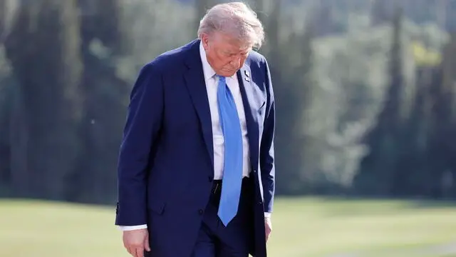 epa12180134 US President Donald Trump leaves after a family photo during the Group of Seven (G7) Summit at the Kananaskis Country Golf Course in Kananaskis, Alberta, Canada, 16 June 2025. World leaders are gathered from 15 to 17 June 2025 for the annual G7 Summit. EPA/LUDOVIC MARIN / POOL
