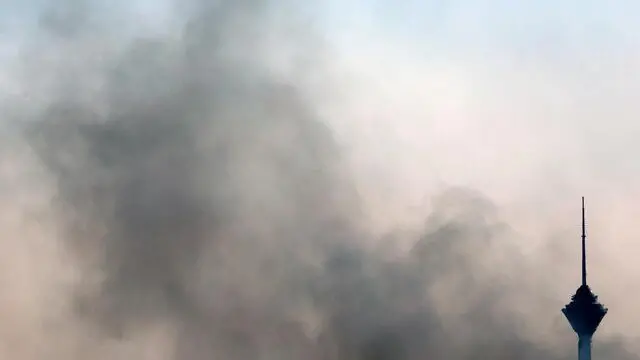 epa12183874 Smoke rises near the Milad Tower following an Israeli airstrike on Tehran, Iran, 18 June 2025. Israel and Iran have been exchanging fire since Israel launched strikes across Iran on 13 June 2025 as part of Operation 'Rising Lion.' EPA/ABEDIN TAHERKENAREH