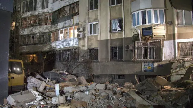 epa12066533 Damage at the site of a drone strike on a residential area in Odesa, southwestern Ukraine, 01 May 2025, amid the Russian invasion. At least two people were killed and 15 others injured in an overnight Russian drone attack on Odesa, damaging residential buildings, private houses, a supermarket, a school and cars, the State Emergency Service of Ukraine said. EPA/IGOR TKACHENKO