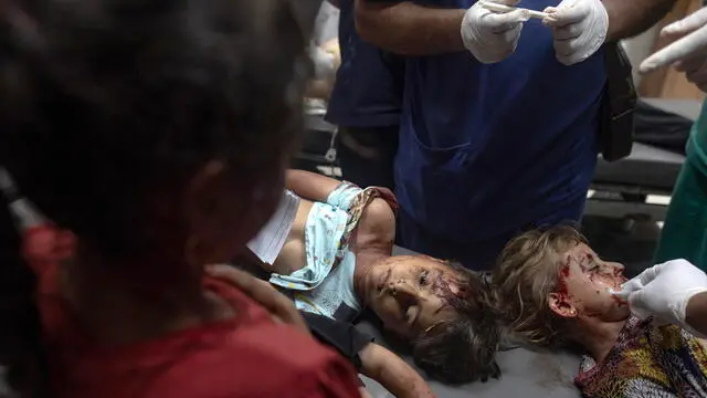 epaselect epa12161780 GRAPHIC CONTENT - Injured Palestinian children receive treatment at Nasser Hospital after Israeli aistrikes hit near the tents of displaced persons west of Khan Yunis, southern Gaza Strip, late 06 June 2025 (issued 07 June 2025). More than 54,600 Palestinians have been killed in the Gaza Strip, according to the Palestinian Ministry of Health, since Israel launched a military campaign in the strip in response to a cross-border attack led by the Palestinian militant group Hamas on 07 October 2023, in which about 1,200 Israelis were killed and more than 250 taken hostage. EPA/HAITHAM IMAD -- ATTENTION EDITORS: GRAPHIC CONTENT