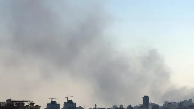 epa12181040 Smoke rises after an Israel airstrike in central Tehran, Iran, 17 June 2025. Israel has been conducting strikes across Iran since 13 June, targeting nuclear, military and energy facilities, prompting Iran to launch retaliatory waves of missiles and drones toward Israel. EPA/ABEDIN TAHERKENAREH