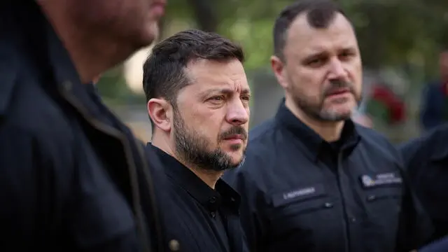 epa12185347 A handout photo made available by the Ukrainian Presidential Press Service shows Ukraine's President Volodymyr Zelensky visiting the site of a Russian attack on a residential building in the Solomianskyi district of Kyiv, Ukraine, 19 June 2025, amid the Russian invasion. Zelensky laid flowers and honored the memory of the 23 victims recovered from the destroyed building, which was struck by a Russian attack on 17 June, the Ukrainian presidential palace reported. EPA/UKRAINIAN PRESIDENTIAL PRESS SERVICE HANDOUT -- MANDATORY CREDIT: UKRAINIAN PRESIDENTIAL PRESS SERVICE -- HANDOUT EDITORIAL USE ONLY/NO SALES