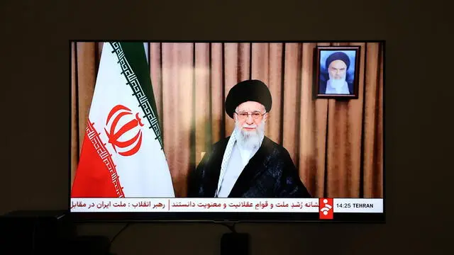 epaselect epa12183099 Iranian state television (IRIB) broadcast a message from Iran's Supreme Leader Ayatollah Ali Khamenei to the nation, in Tehran, Iran, 18 June 2025. The supreme leader stated that Iran will not accept US calls for an unconditional surrender, as the Iran-Israel conflict entered its sixth day. Israel has been conducting strikes across Iran since 13 June, targeting nuclear, military, and energy facilities, prompting Iran to launch retaliatory waves of missiles and drones toward Israel. EPA/ABEDIN TAHERKENAREH