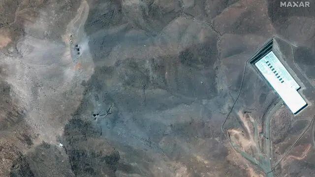epa12190792 A handout satellite image made available by Maxar Technologies shows a closer view of craters and ash on a ridge at the Fordo underground uranium enrichment following US airstrikes, in Iran, 22 June 2025. The US forces struck three of Iran's key nuclear sites: Natanz, Isfahan and Fordo (Fordow), US President Trump announced on 21 June. EPA/MAXAR TECHNOLOGIES HANDOUT MANDATORY CREDIT: SATELLITE IMAGE 2025 MAXAR TECHNOLOGIES -- THE WATERMARK MAY NOT BE REMOVED/CROPPEDHANDOUT EDITORIAL USE ONLY/NO SALES