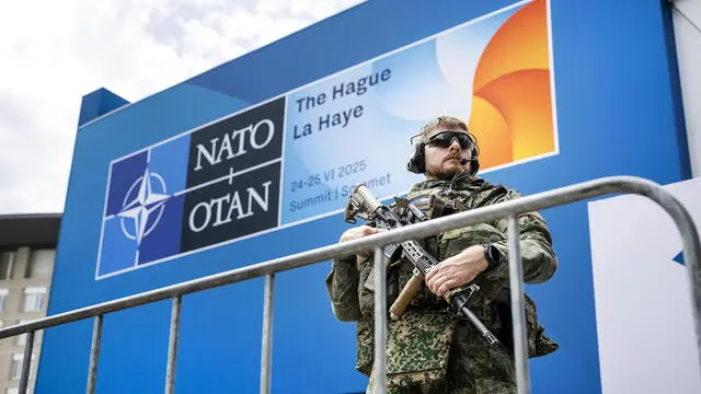 epaselect epa12190804 An armed security member guards the World Forum, the venue of the NATO summit, in The Hague, the Netherlands, 22 June 2025. The Hague will host a NATO Summit from 24 to 25 June, the first such summit to be held in the Netherlands. EPA/REMKO DE WAAL