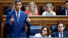 epa12182605 Spanish Prime Minister Pedro Sanchez (L) speaks during the Government control session at the Lower House of Parliament in Madrid, Spain, 18 June 2025. EPA/MARISCAL
