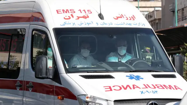 epa08761529 An Ambulance drives past in a street in Tehran, Iran, 21 October 2020. According to the Iranian Health ministry, Iran reported its highest daily COVID-19 infections by announcing 5616 new infections and 312 deaths in past 24 hours as it appears that Iran is in the grip of a third wave of COVID-19 outbreak. EPA/ABEDIN TAHERKENAREH