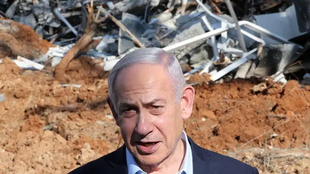 epa12187700 Israel's Prime Minister Benjamin Netanyahu speaks to the press during a visit to the site of the Weizmann Institute of Science, which was hit by Iranian missiles in the central city of Rehovot, Israel, 20 June 2025. Iran and Israel have been exchanging fire since Israel carried out missile strikes on Iran on 13 June 2025. EPA/JACK GUEZ / POOL