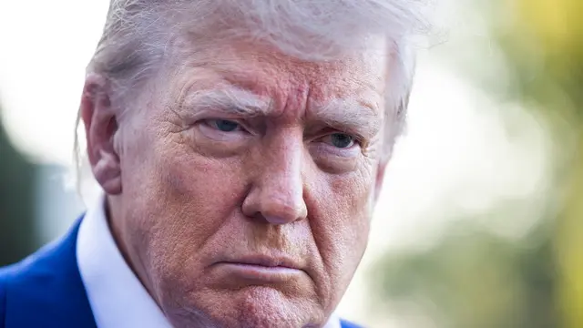 epa12194392 US President Donald Trump speaks to the media as he departs the White House for the NATO leaders summit, in Washington, DC, USA, 24 June 2025. The president answered questions about accusations of ceasefire violations in the Iran-Israel conflict. EPA/JIM LO SCALZO