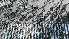 Persone in strada - © www.giornaledibrescia.it
