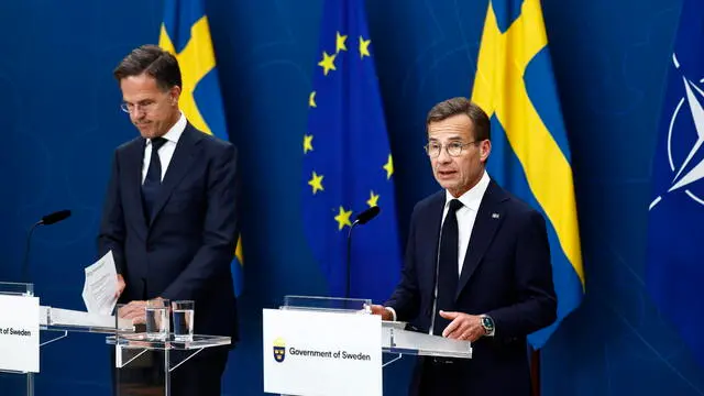epa12172887 Swedish Prime Minister Ulf Kristersson (R) and NATO Secretary General Mark Rutte (L), during a press conference in Stockholm, Sweden, 13 June 2025. EPA/STEFAN JERREVANG SWEDEN OUT
