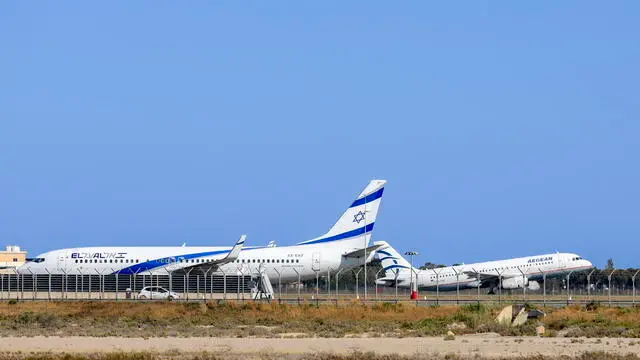 epa12185919 An israeli El Al commercial jet evacuated during the ongoing war between Israel and Iran, is parked on the tarmac at Larnaca International airport, in Larnaca, Cyprus, 19 June 2025. Israel and Iran have been exchanging fire since Israel launched strikes across Iran on 13 June 2025 as part of Operation 'Rising Lion.' EPA/ALEX MITA