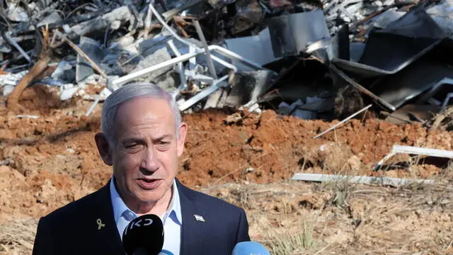 epa12187701 Israel's Prime Minister Benjamin Netanyahu speaks to the press during a visit to the site of the Weizmann Institute of Science, which was hit by Iranian missiles in the central city of Rehovot, Israel, 20 June 2025. Iran and Israel have been exchanging fire since Israel carried out missile strikes on Iran on 13 June 2025. EPA/JACK GUEZ / POOL